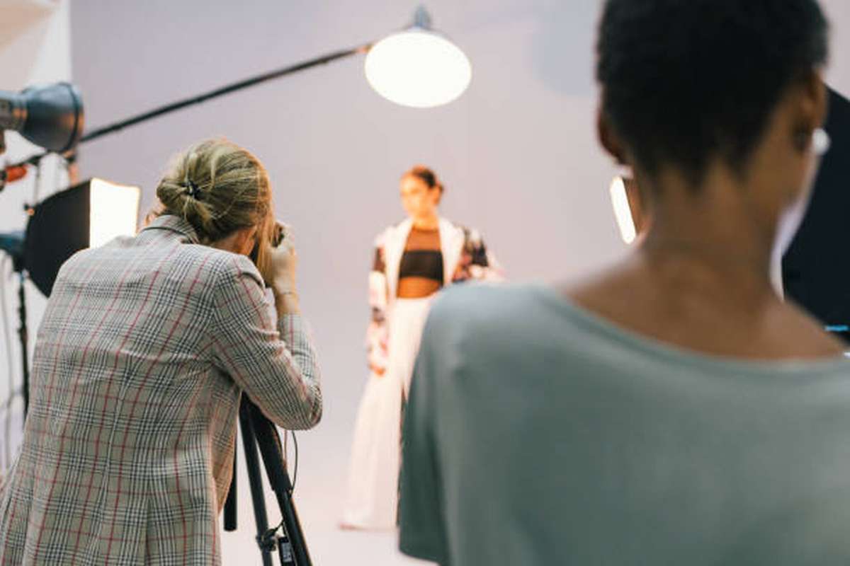 Photographer in a session with a model