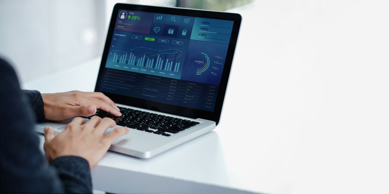 technology-finance-business-marketing-concept-modern-businessman-using-laptop